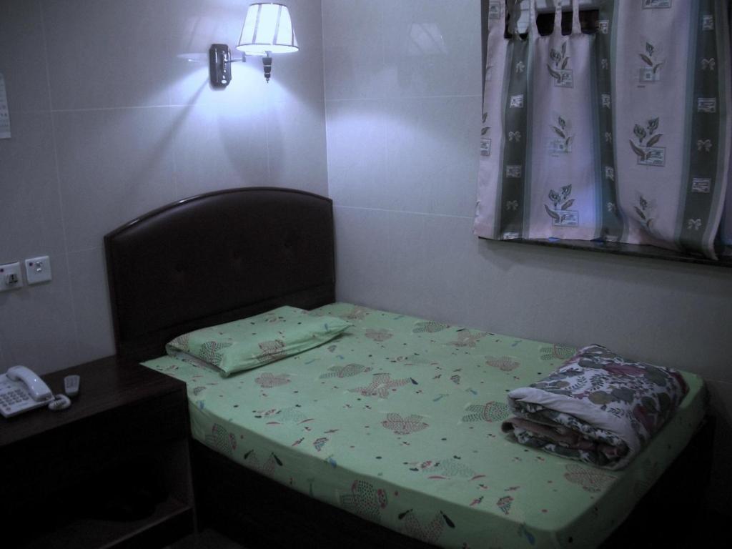 Kowloon Youth Village Tsim Sha Tsui 九龙青年公寓 Hong Kong Room photo